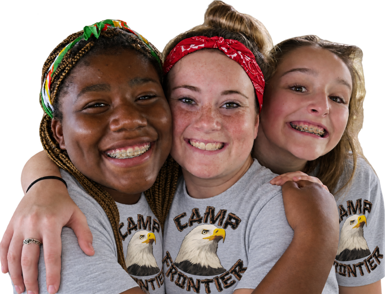 Three smiling Camp Frontier friends
